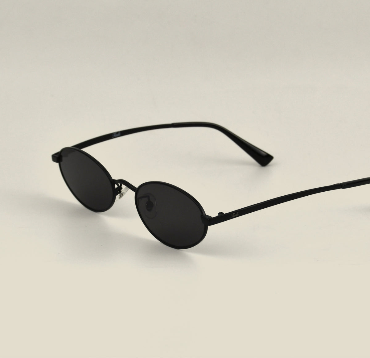 TUDI Juless Black with dark lenses eyewear, three-quarter side view