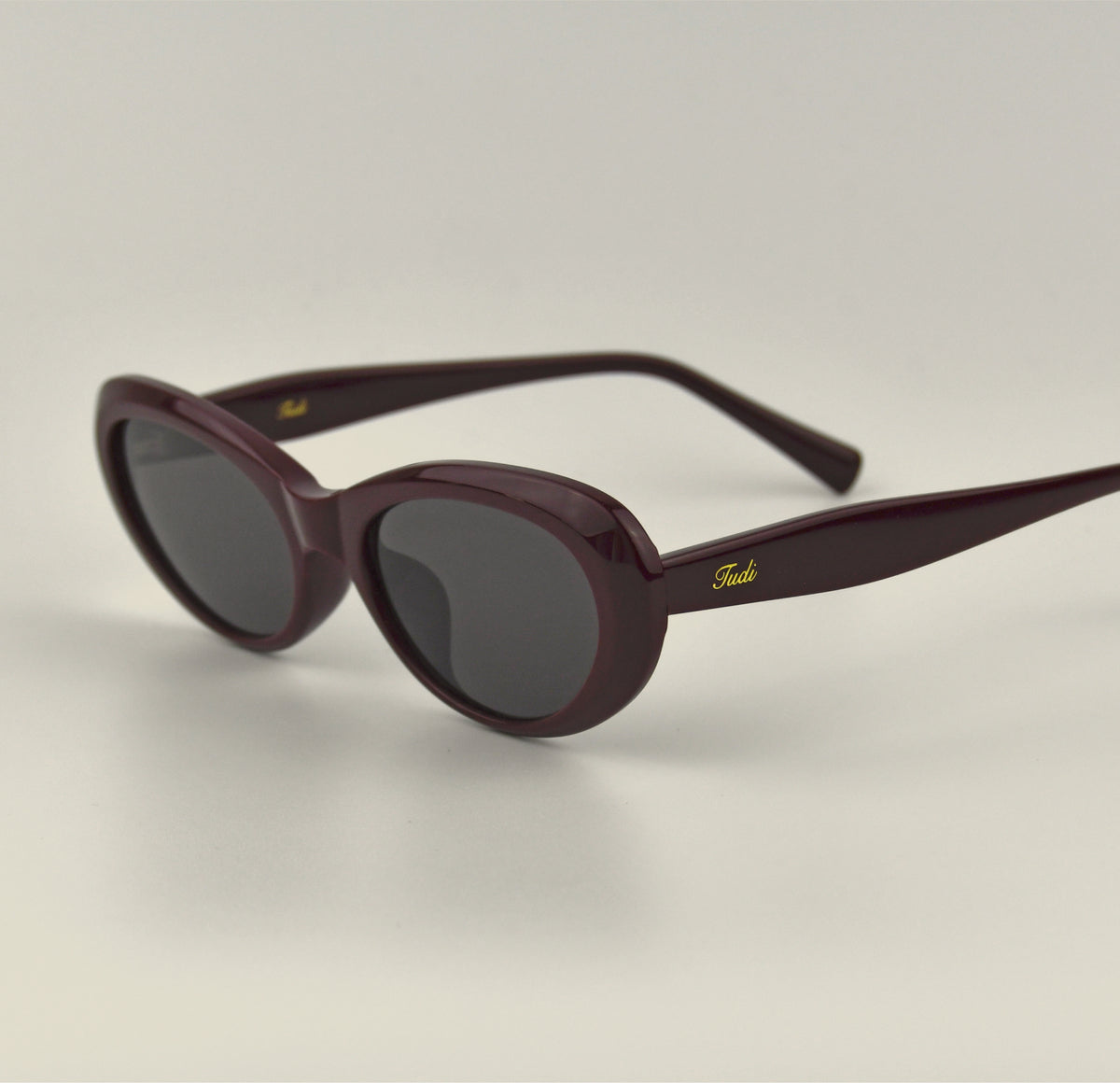 TUDI Pinta Burgundy eyewear, three-quarter side view
