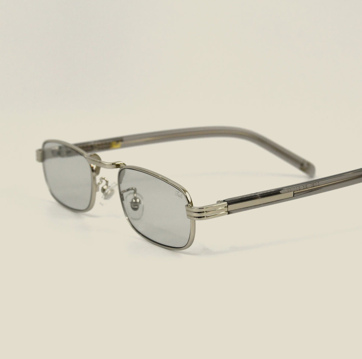 TUDI Axel silver-frame sunglasses, three-quarter view