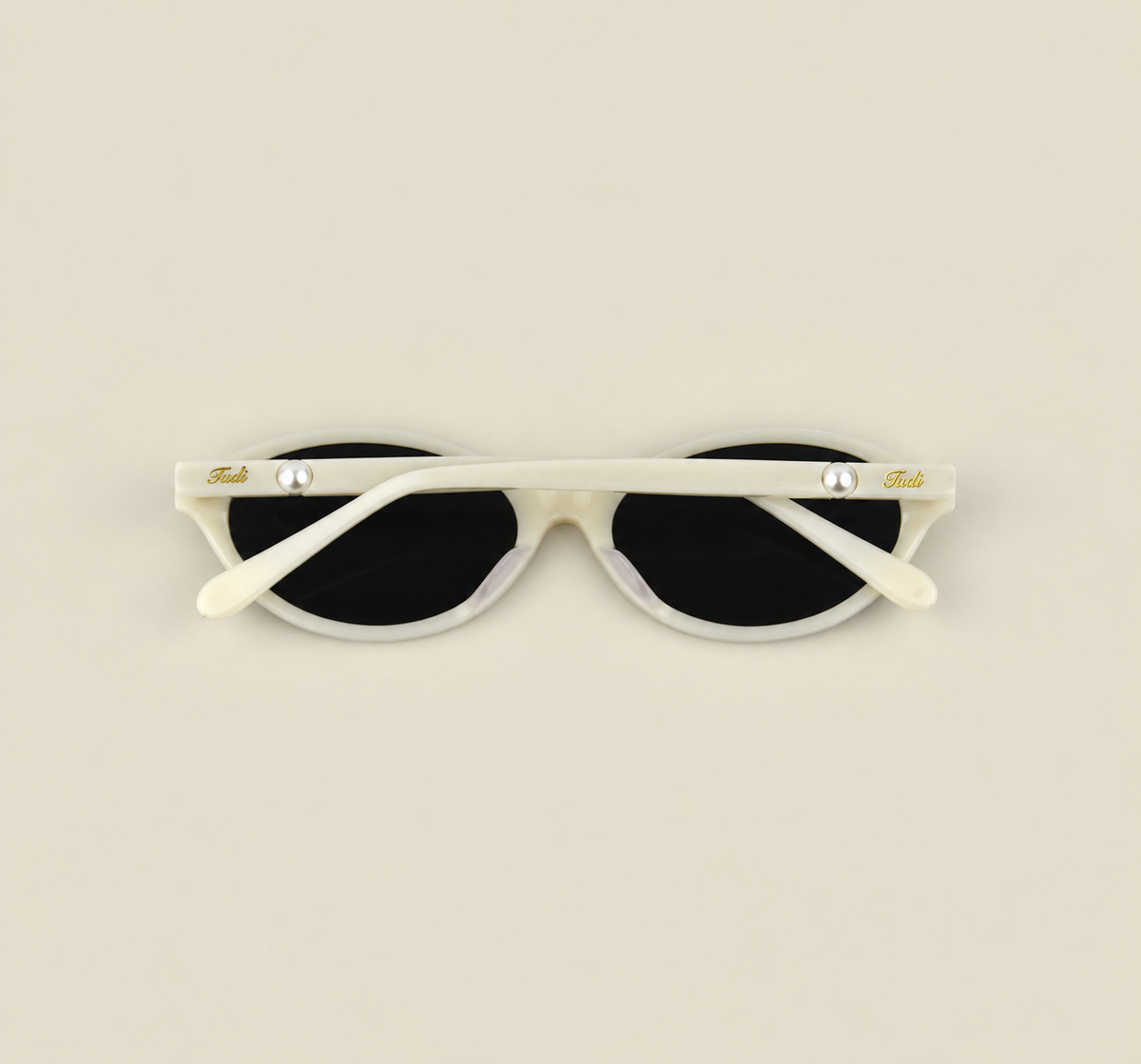 TUDI Ayla White eyewear, back, folded view