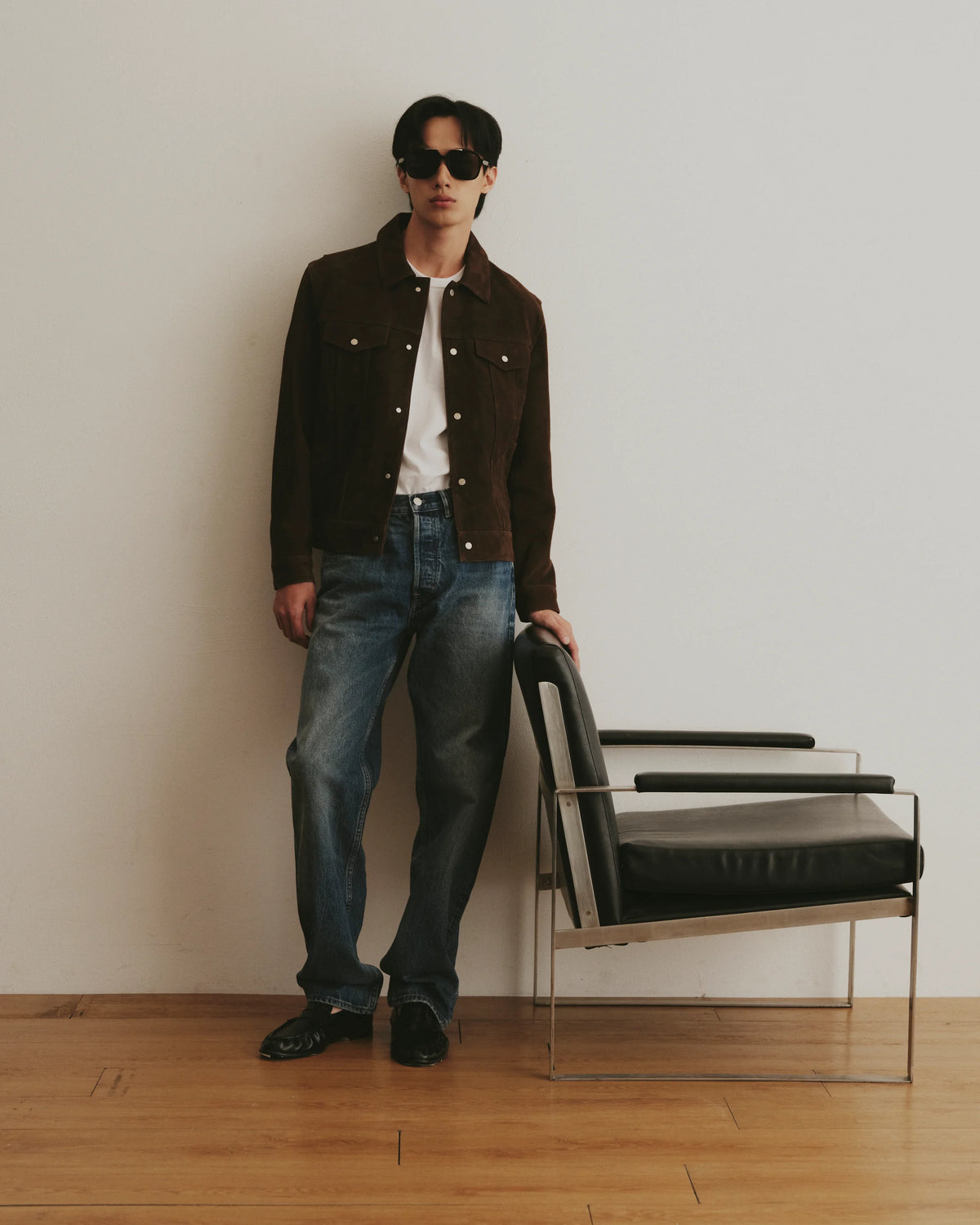 TUDI Blake eyewear, lifestyle, black frame; dark lenses