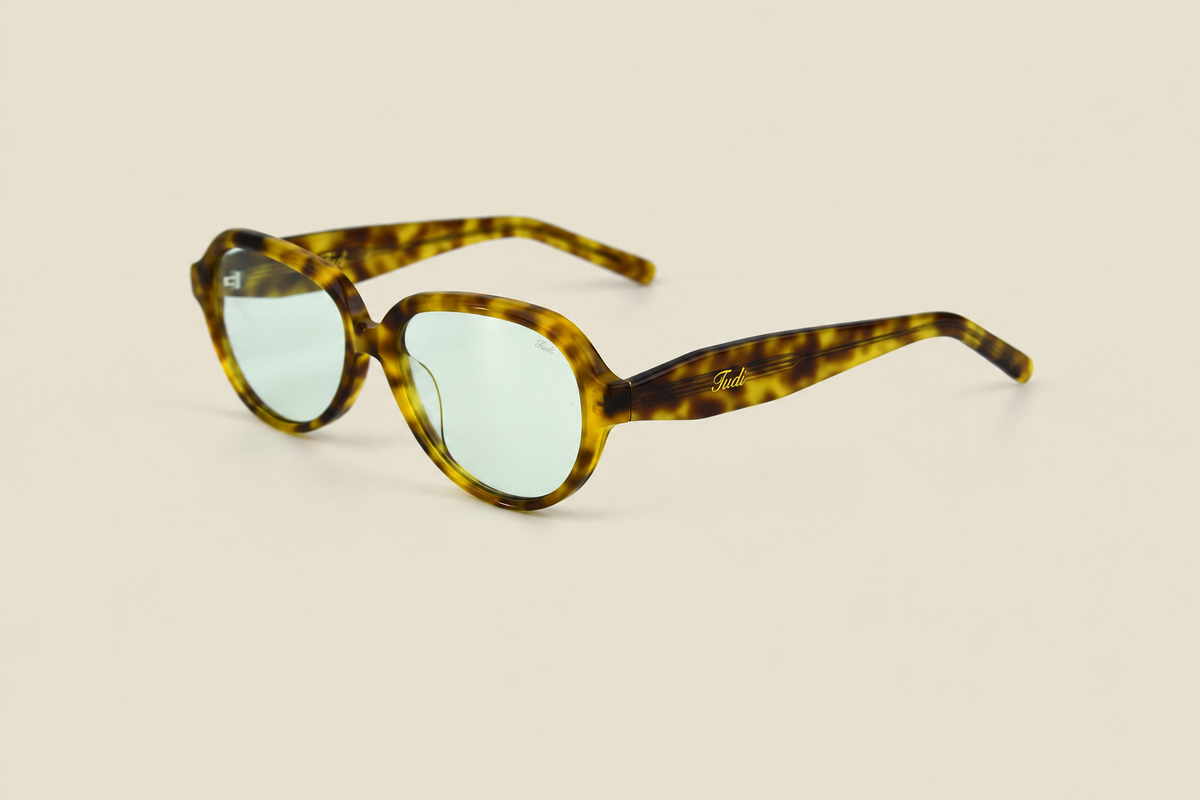 TUDI Clay Havana Green eyewear, three-quarter view