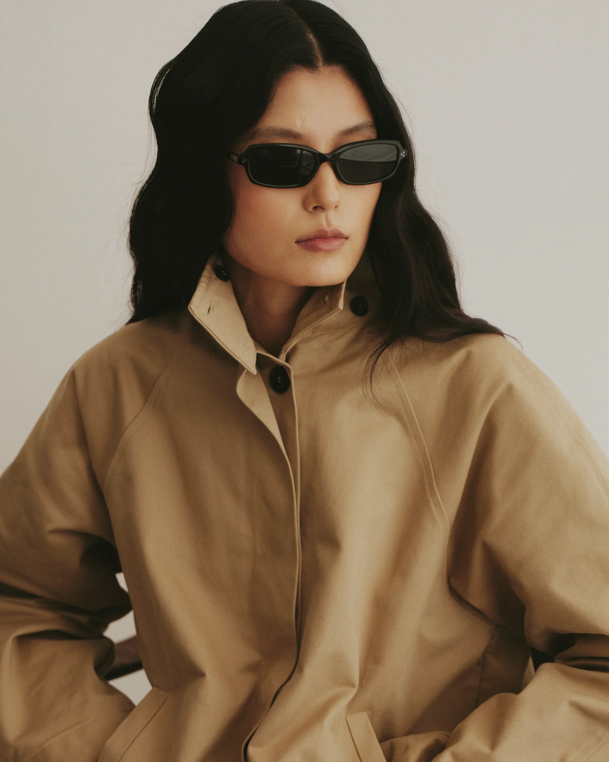 TUDI Elio eyewear, lifestyle, black frame; dark lenses