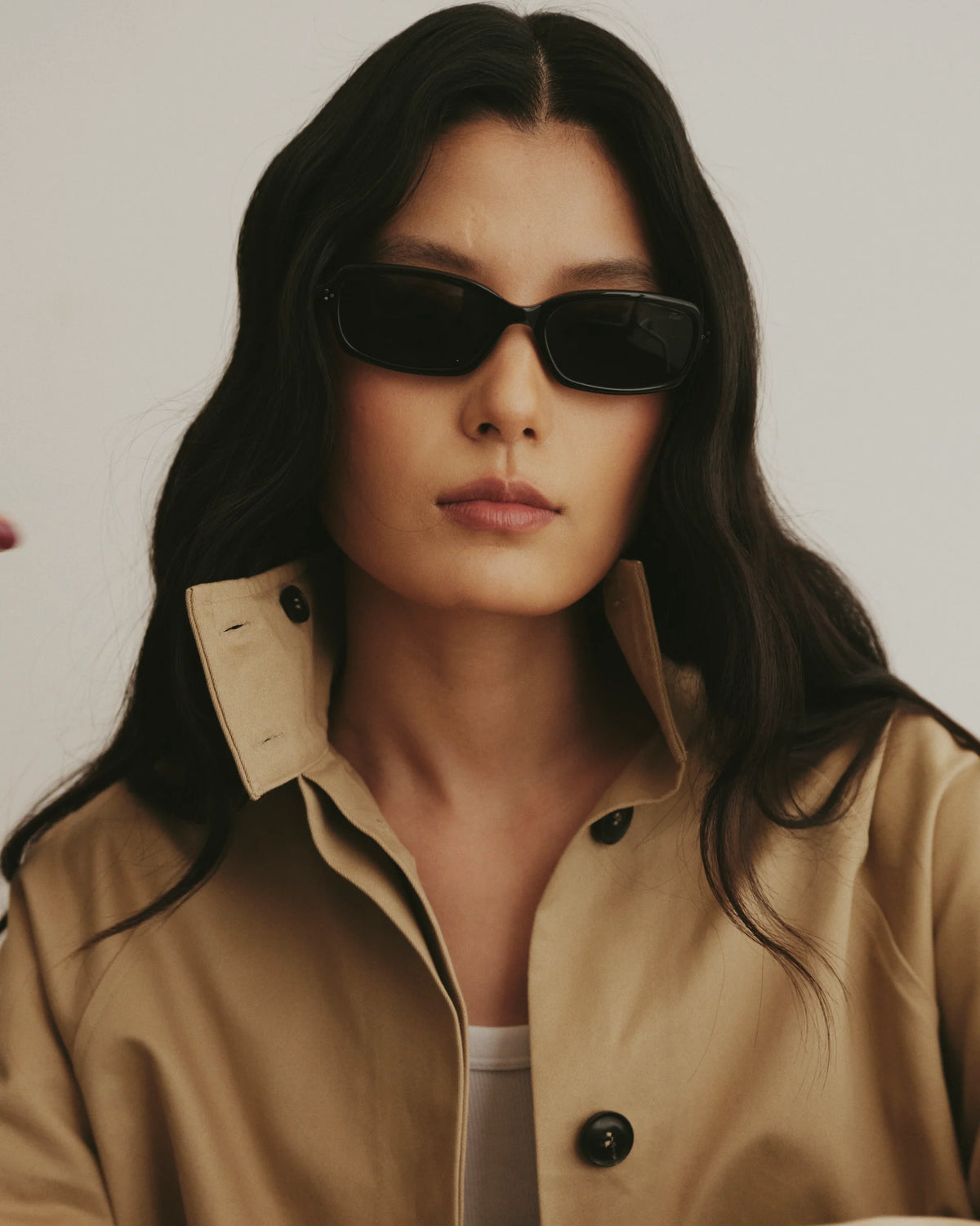 TUDI Elio eyewear, lifestyle, black frame; dark lenses
