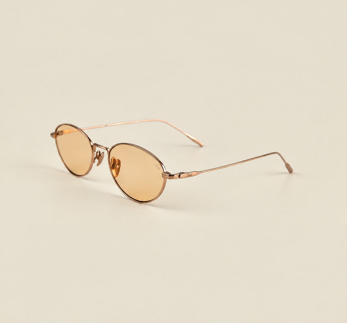 TUDI Martini Rose Gold Orange eyewear, three-quarter view