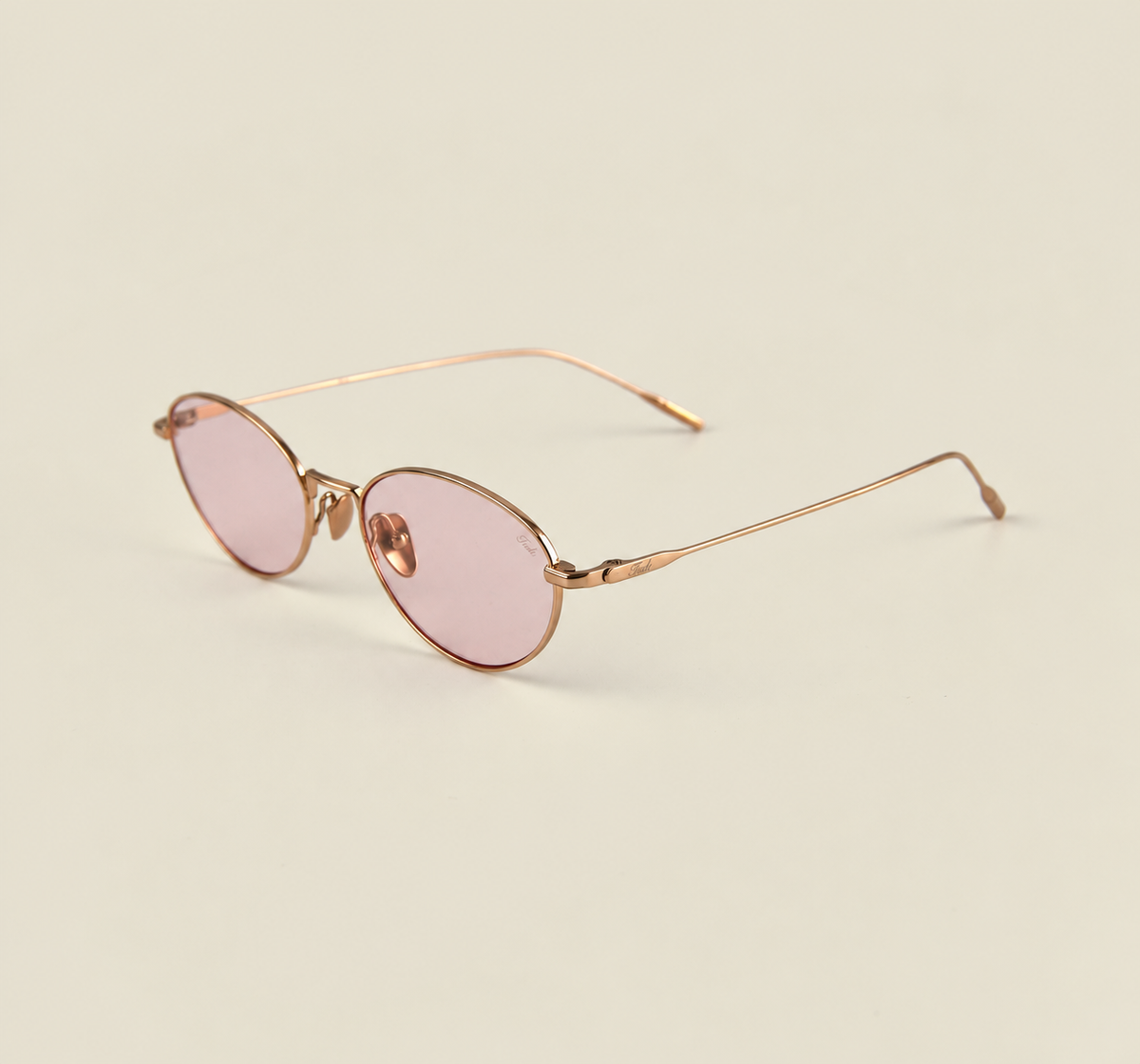 TUDI Martini Rose Gold Pink eyewear, three-quarter view