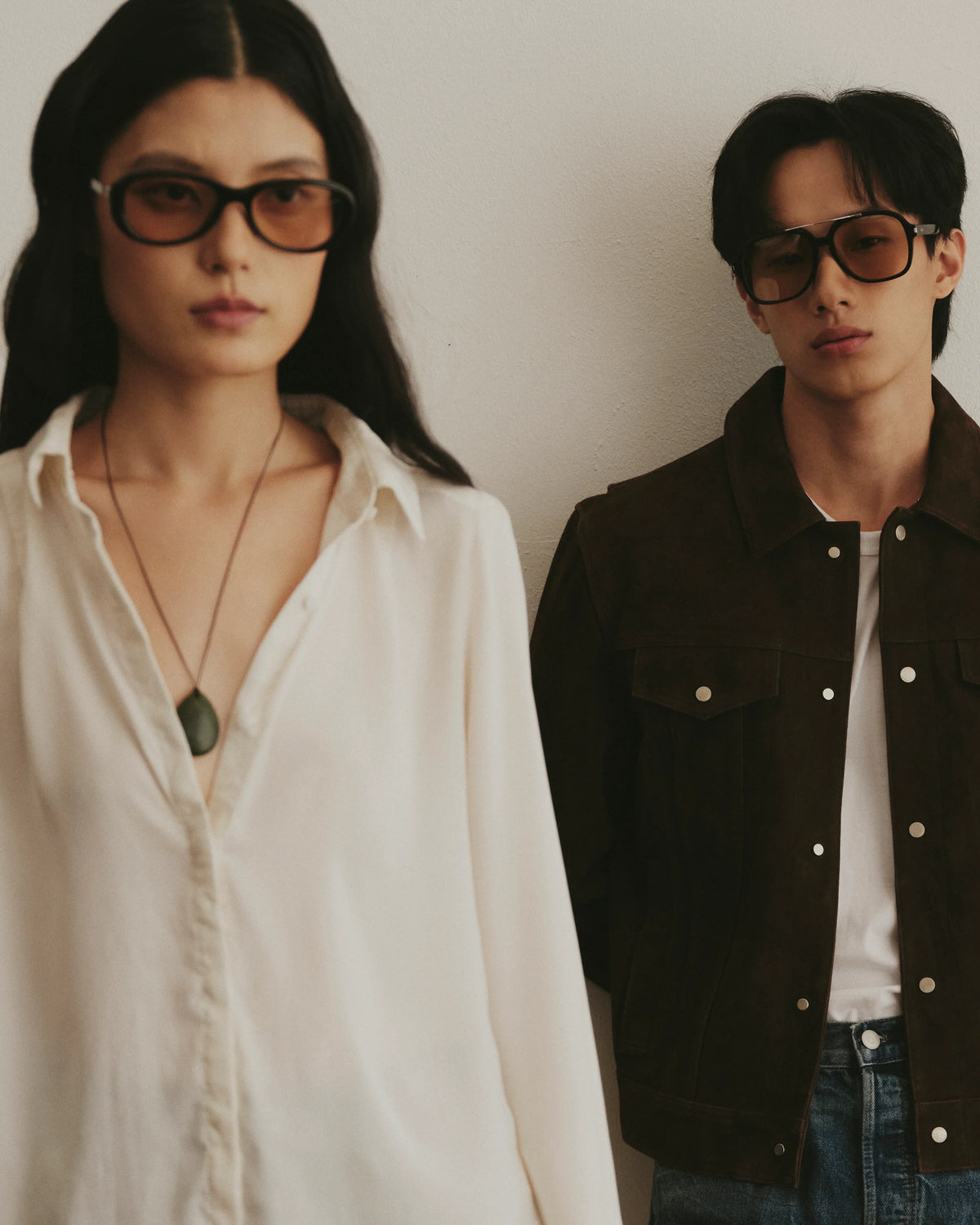 TUDI Nook and Blake eyewear, lifestyle, nook black/rose; blake black/pale