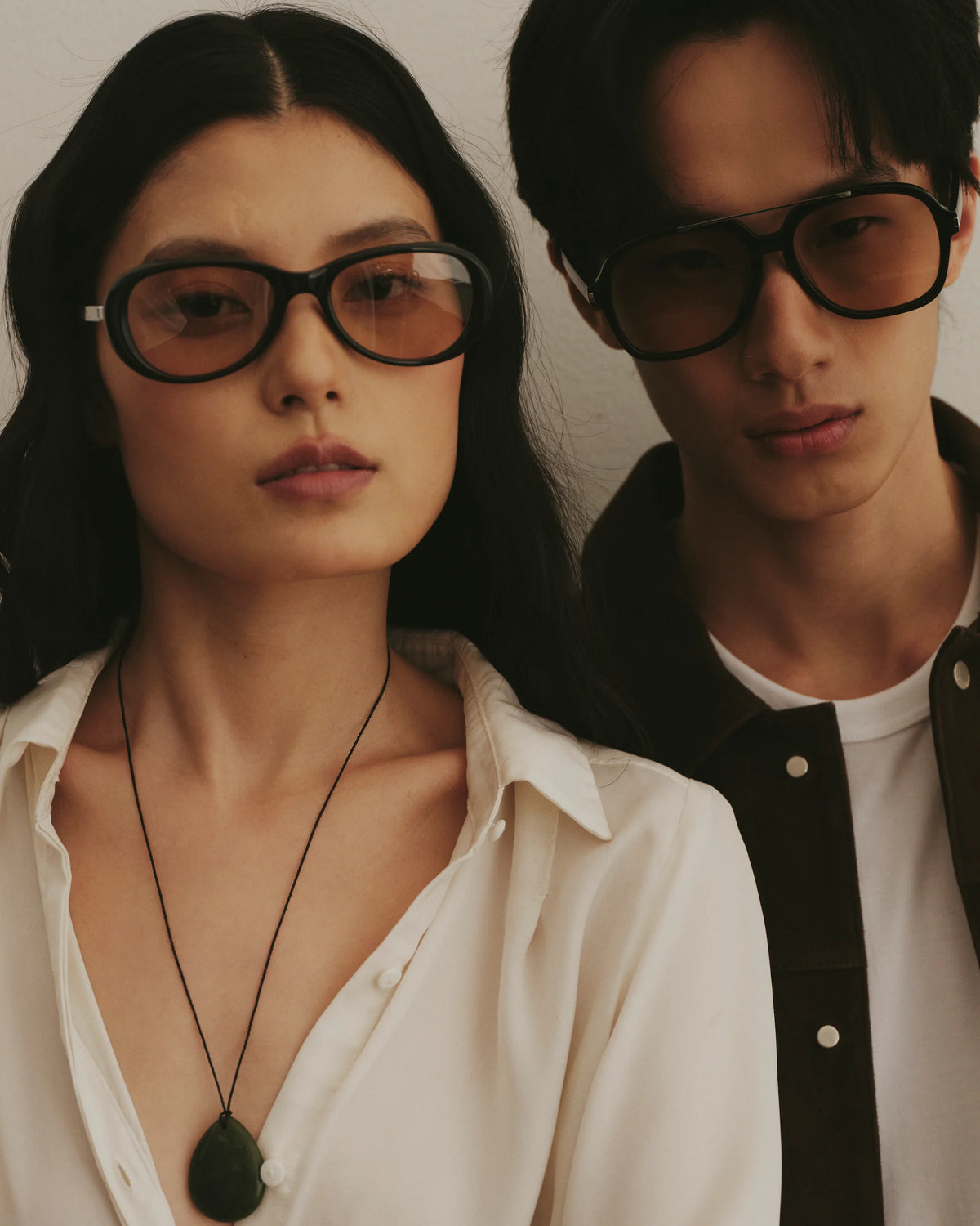 TUDI Nook and Blake eyewear, lifestyle, nook black/rose; blake black/pale