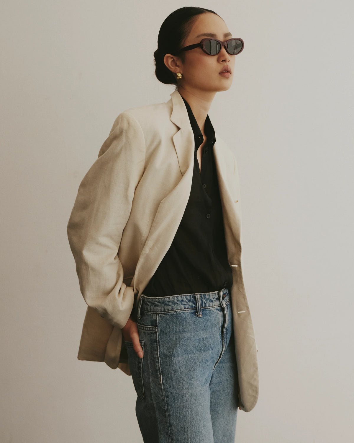 TUDI Pinta Burgundy-purple frame; dark lenses eyewear, lifestyle
